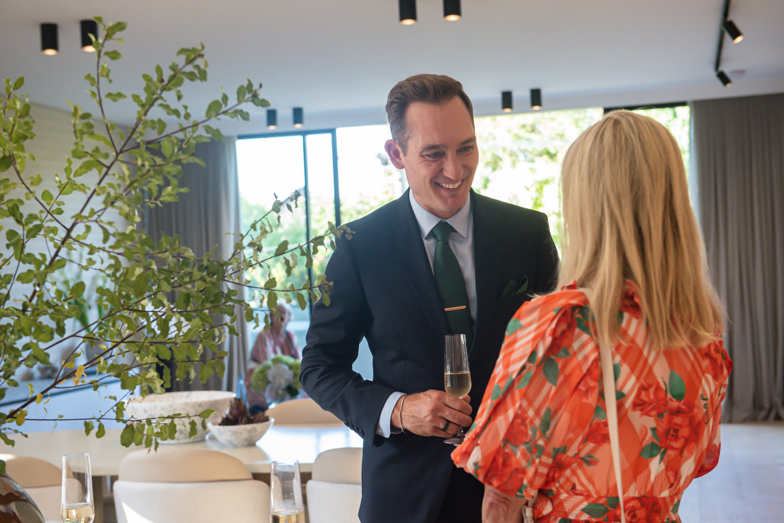 James Driver with a client at a property launch in Brighton